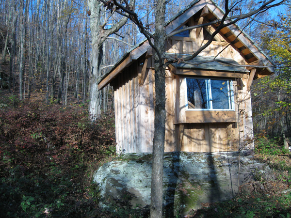 Between a Rock and Stone mark rogers tiny house rock foundation